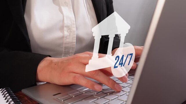 Close-up of a professional woman's hands using a computer with an animated bank icon and a button that says 24/7. Cash availability 24 hours a day, 7 days a week.