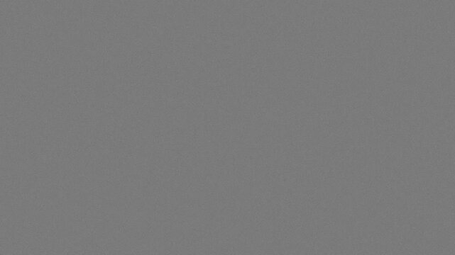 35mm film grain texture overlay with subtle noise on gray background, seamless loop