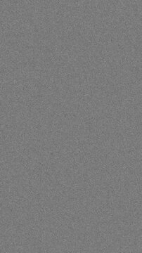 Vertical format retro 8mm film grain with dust and noise for authentic home video style, seamless loop