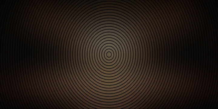 Concentric circles radiating from center in dark brown tones creating hypnotic circular pattern background.