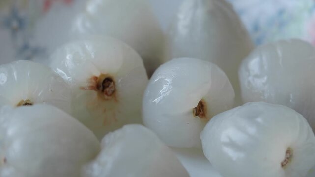 Discovering lychee fruit in a local market in summer