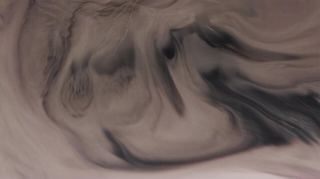 Acrylic waves. Liquid marble. Defocused white dark black paint texture in water chemical ink flow on abstract art creative background.