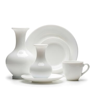 White ceramic tableware set on white background