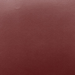 Fototapeta premium Textured maroon leather background with copy space