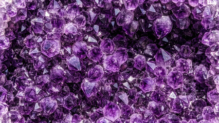 Fototapeta premium Macro Close-Up Top View of Purple Amethyst Crystal Cluster Filling Full Frame — Premium Gemstone Mineral and Healing Stone Texture Background Photography