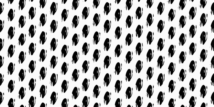 Black ink dot pattern on a white background abstract design
