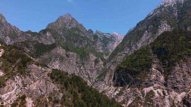 Friulian Dolomites landscape with a view towards distant mountain peaks. Beautiful alpine moving shot.