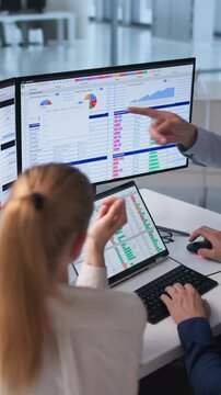 Medical Billing Analyst Coding Spreadsheets On Laptop