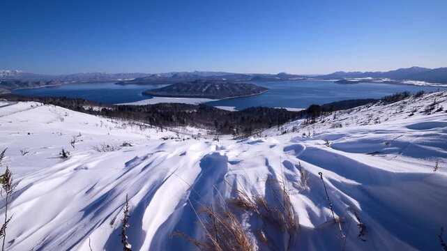 屈斜路湖と雪紋