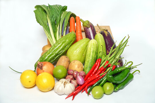 Fresh Assorted Vegetables and Fruits Isolated on White Background for Healthy Eating Concept