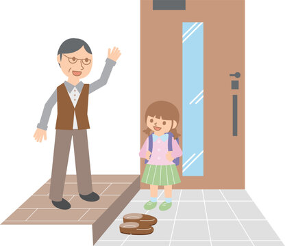 玄関で登校する女の子を見送る祖父・ランドセル・朝の見送り
