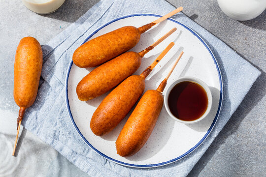 Homemade Pancake Wrapped Sausage Corndogs on a Stick