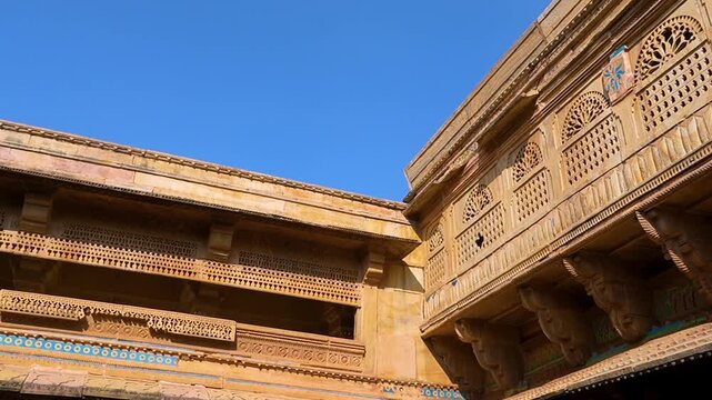 Cultural Heritage Landmark of Gwalior Fort Against Vibrant Blue Sky