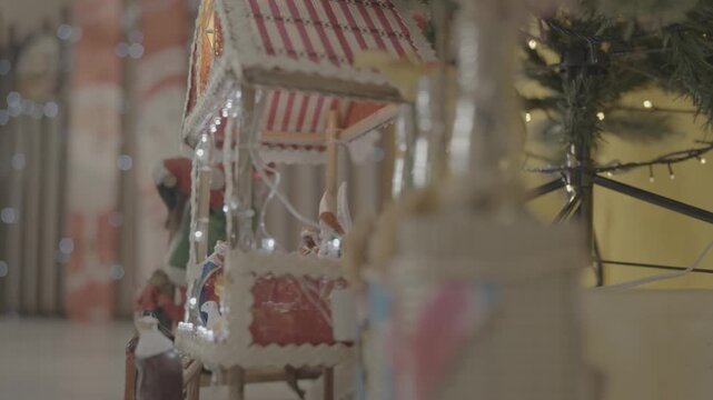 4K S-Log close-up footage of Christmas ornaments featuring detailed festive decorations with warm holiday lighting, ideal for seasonal, commercial, and holiday-themed video projects.
