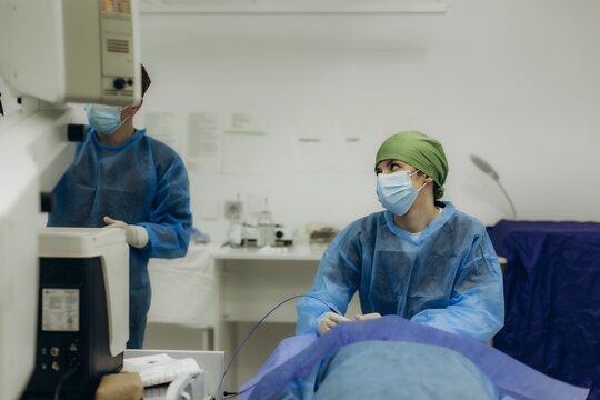 Surgeon performing medical procedure in operating room