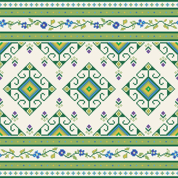Intricate pixel pattern featuring geometric shapes and floral designs green, blue, and yellow