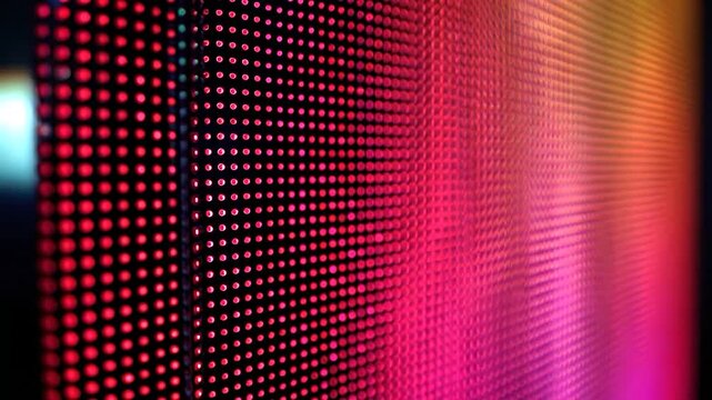 Vibrant LED screen displaying a dynamic array of colorful pixels