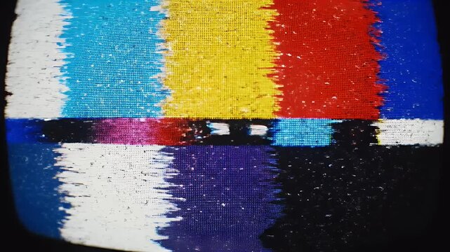 Retro TV screen with colorful test pattern and static noise, vintage broadcast signal interference.