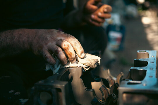 cleaning and disassembling car parts