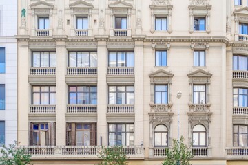 Fototapeta premium Classical Architecture Facade with Ornate Windows and Stone Balustrades, Building Exterior, Front Residential View
