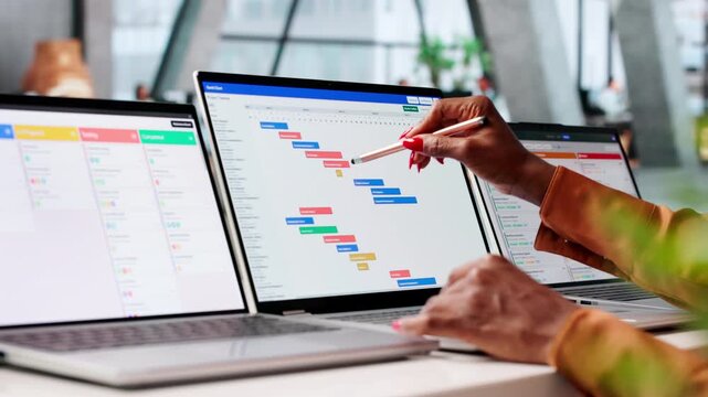 Agile Project Manager Plans Tasks Using Kanban Board
