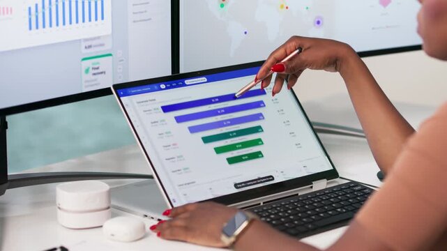 Marketing Manager Analyzes Digital Sales Funnel Data On Laptop