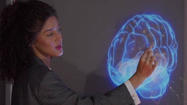 Businesswoman presenting innovative brain technology on digital screen for modern corporate environment