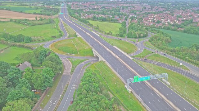 A1(M) motorway corridor near the Angel of the North and Team Valley, Gateshead, Tyne and Wear, England, showing major highway infrastructure, junctions and regional transport connections, drone shot