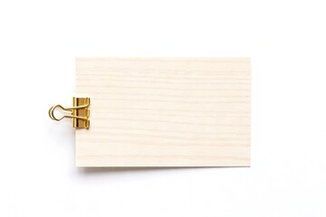 Fototapeta premium Wooden card with gold clip on white background