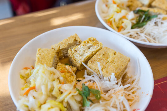 Bowl of asian stinky tofu