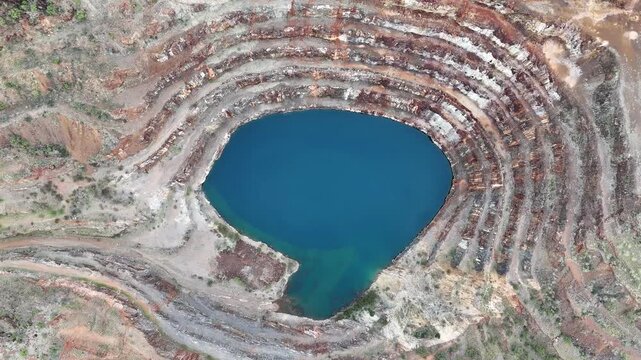 Aerial View of the Abandoned Mary Kathleen Uranium Mine Open Pit with Vibrant Blue Water, Outback Queensland Australia
