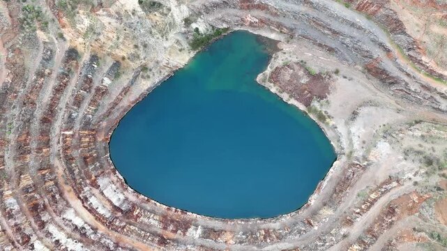 Aerial View of the Abandoned Mary Kathleen Uranium Mine Open Pit with Vibrant Blue Water, Outback Queensland Australia