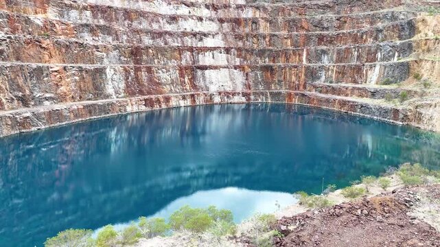 Aerial View of the Abandoned Mary Kathleen Uranium Mine Open Pit with Vibrant Blue Water, Outback Queensland Australia