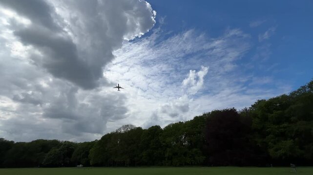 Aircraft flying over Amsterdam Forest park near Schiphol Airport, Netherlands Aircraft flying over Amsterdam Forest