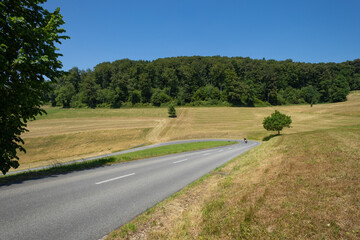 Fototapeta premium The beautiful landscape of the canton of Lucerne. Its well-kept nature with meadows and snakes and roads that cross it.