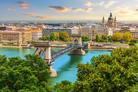 Budapest cityscape at sunset with Chain Bridge and St. Stephen's Basilica view from Buda Castle