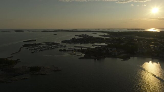 Aerial view around the of Hanko city marina and coastal islands, summer evening