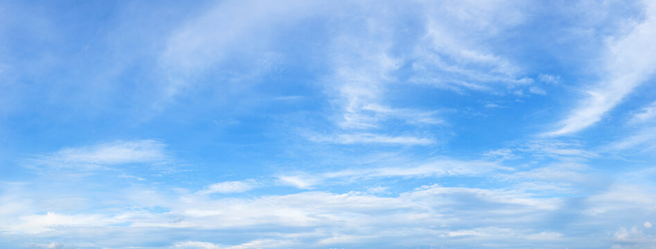 melting clouds filled the blue sky illuminated by sunlight