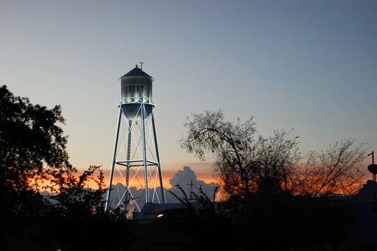 Water tower at night with sunset in Gilbert Arizona