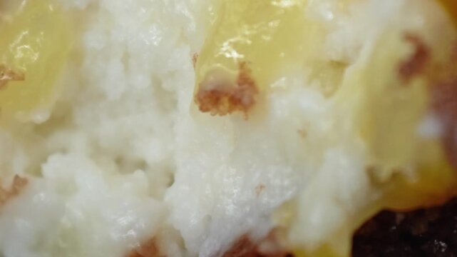 Texture of cake with cream as a close up background. Macro view cake. Bakery texture. 
