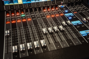 Professional Digital Mixing Console with Illuminated Faders and Channel Strips — Live Sound, Broadcast, and Music Production Technology © SvenKrueger