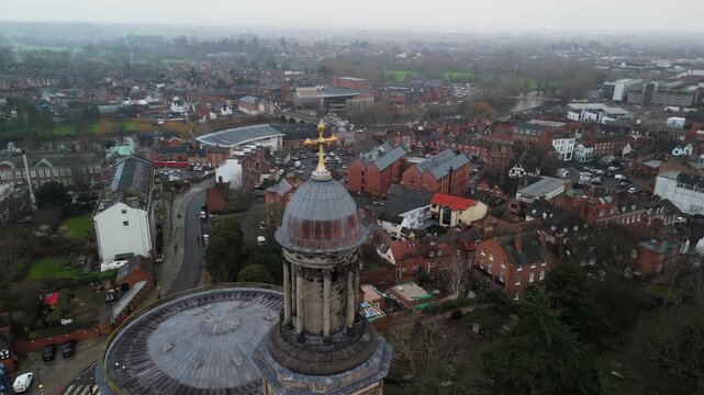 Close Aerial View of St Chad's Church Dome and Golden Cross Over Shrewsbury Skyline