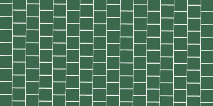 Wide green subway tile wall, with a classic horizontal brick pattern texture