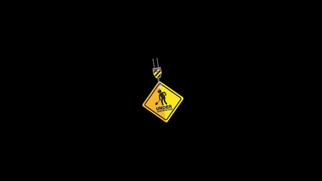 Under construction warning icon animation isolated on an alpha channel background 
