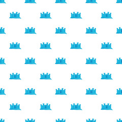 Naklejka premium Blue ice castle shapes repeating in a seamless pattern on a white background