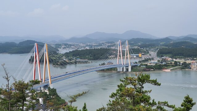 Jindo Bridge - Cable-stayed bridge crossing the Myeongnyang Strait in South Korea. Modern civil engineering, beautiful coastal infrastructure travel image.