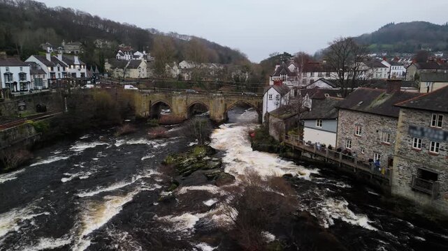 Aerial View of Llangollen Town, River Dee and Stone Bridge with Heritage Railway, Wales