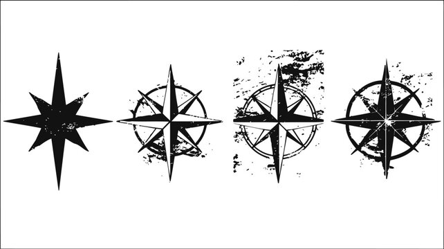 Set of four black grunge compass rose designs with different distressed textures and sharp points