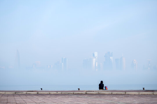 Doha Aerial view of West bay Doha during fog, hazy and mist weather in Qatar 	