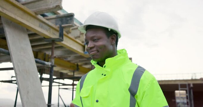 Construction, foreman and talk on radio on site for task coordination, shift handover and command. Project manager, black person and communication for labor pacing, building supervision and feedback